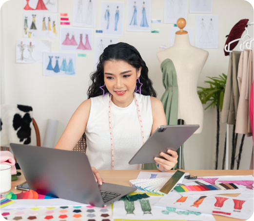 Business owner in her business using a computer